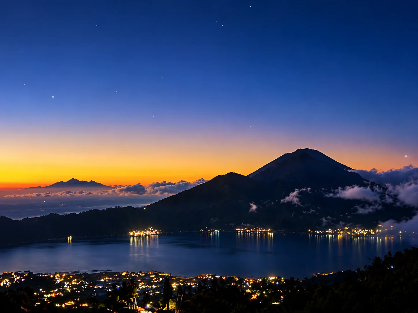 Mount Batur and lake before sunrise